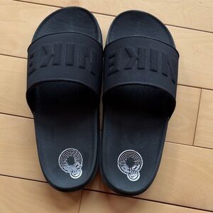 Nike Women’s Black Slide Sandals with Embossed Logo